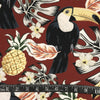 POLYESTER DÉCO ET NAPPE TOUCAN ET ANANAS FOND ROUGE