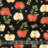 COTON IMPRIMÉ POMMES FOND NOIR