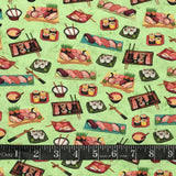 COTON IMPRIMÉ SUSHIS FOND VERT