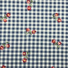 COTON IMPRIMÉ FLEURS AU FOND BLEU CARROTTÉ