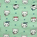 FLANELLETTE IMPRIMÉE PETITS CHATS BLANCS FOND VERT