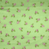 COTON IMPRIMÉ ROSES CARRÉES SUR FOND VERT