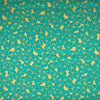 COTON IMPRIMÉ FLEUR TURQUOISE SUR FOND OR