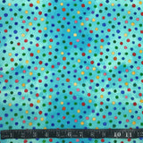 COTON IMPRIMÉ POIS ARC-EN-CIEL SUR FOND BLEU