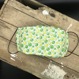 MASQUE POIS VERTS SUR FOND BLANC