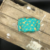 MASQUE FLEURS TURQUOISES SUR FOND OR