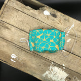 MASQUE FLEURS TURQUOISES SUR FOND OR