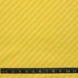 COTON IMPRIMÉ RUBAN JAUNE SUR FOND JAUNE
