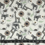FLANELLETTE IMPRIMÉE BLANC ZÈBRES GIRAFFES À BOTTES