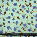 COTON IMPRIMÉ JUNGLE TOTEM TURQUOISE